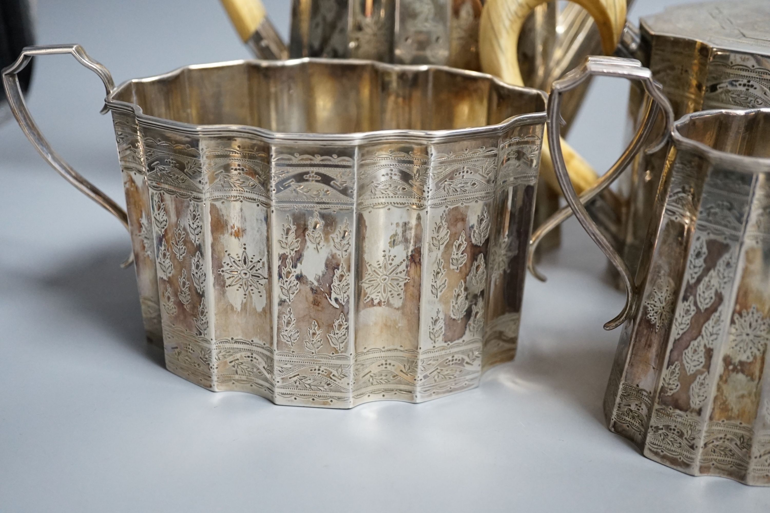 A Victorian four piece engraved silver tea and coffee service, by W & G Sissons, London, 1867, with ivory handles and finial, gross 53.5oz.